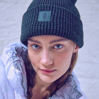 Woman wearing a black fleece beanie