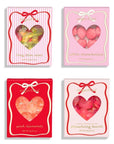 4 pink and red candy boxes