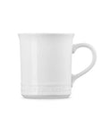 White ceramic mug on a white background