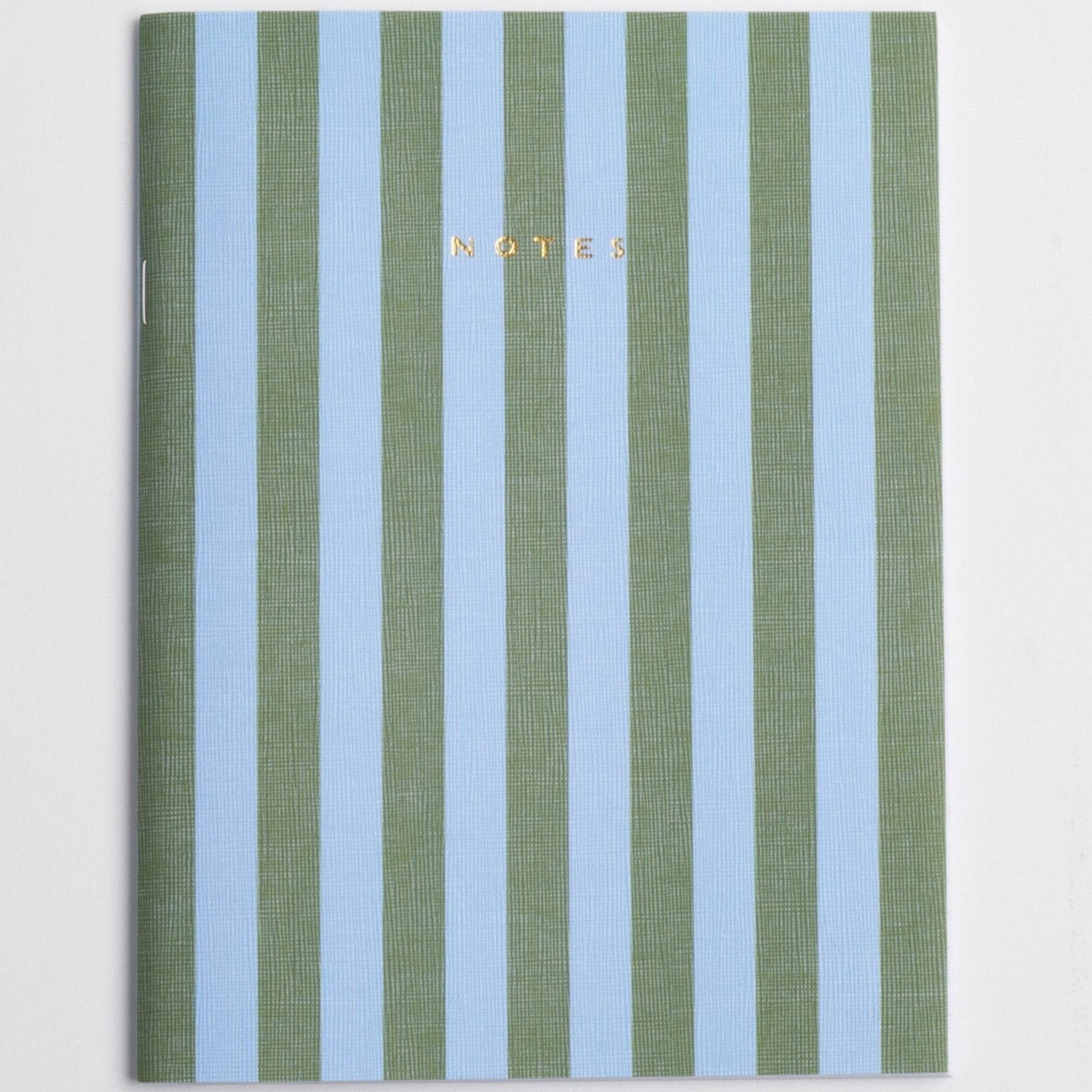 green & blue striped notebook