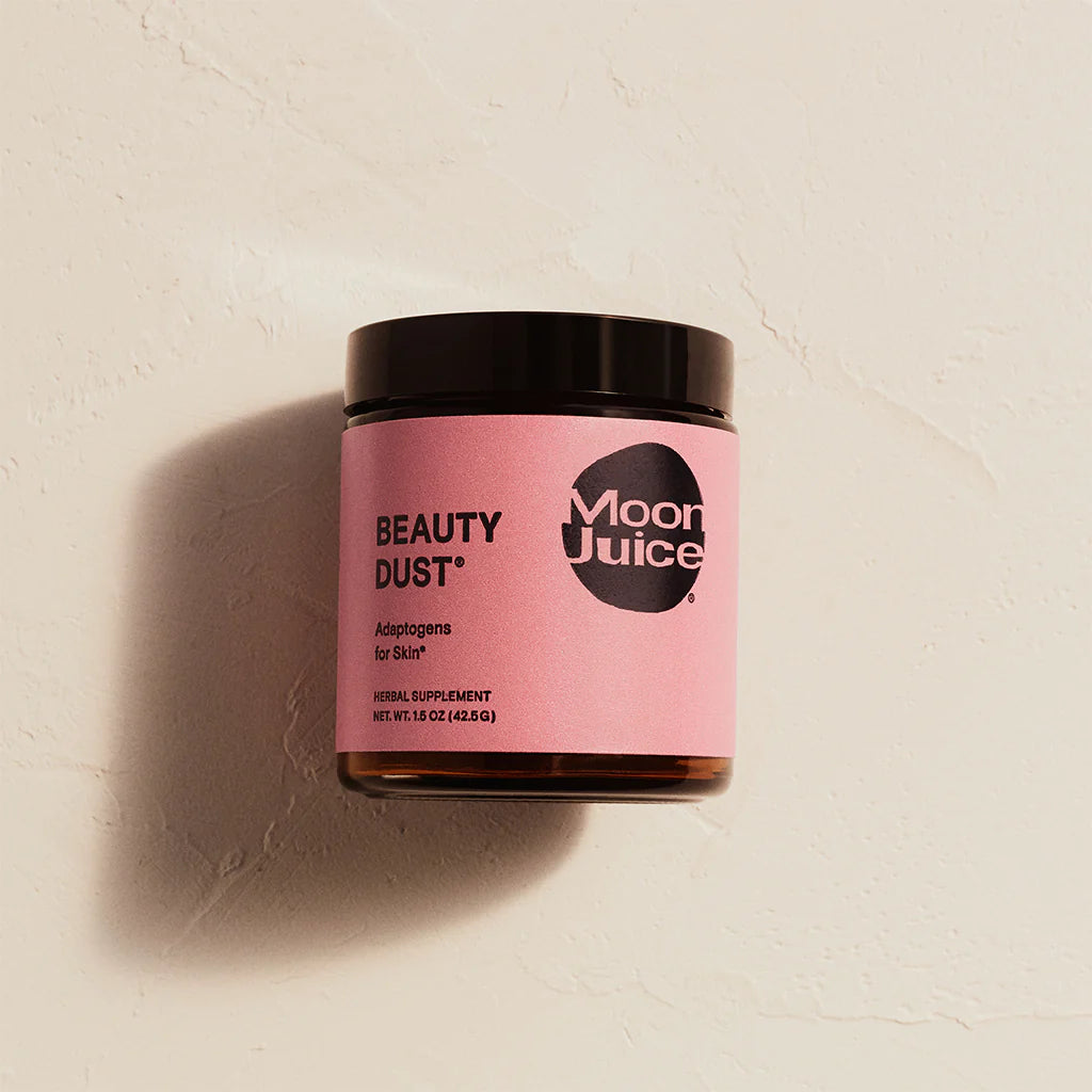 Moon Juice Beauty Dust canister with pink label.