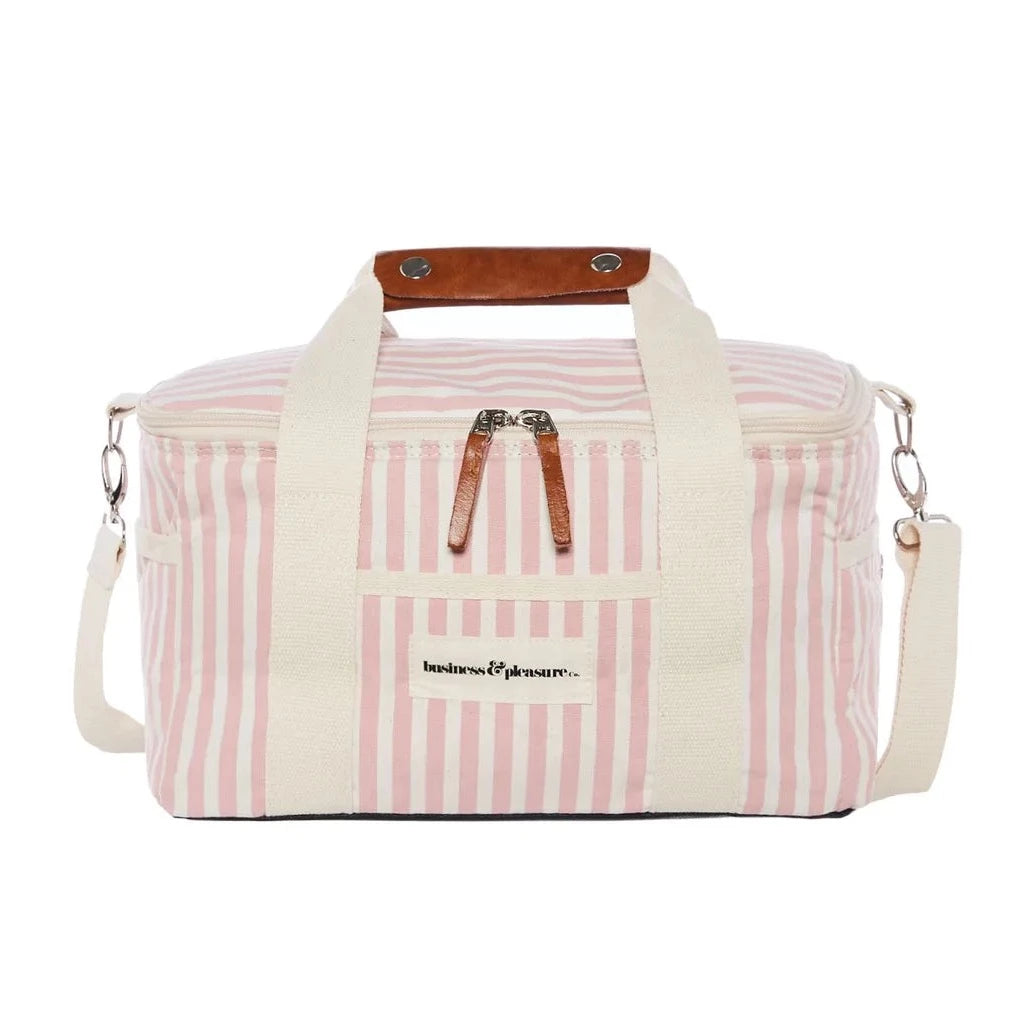 Pink and white striped premium cooler bag. Has white stripe on both ends and a handle with leather accents. 