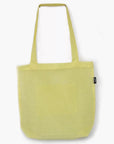 yellow market tote against white background. it mesh like material 