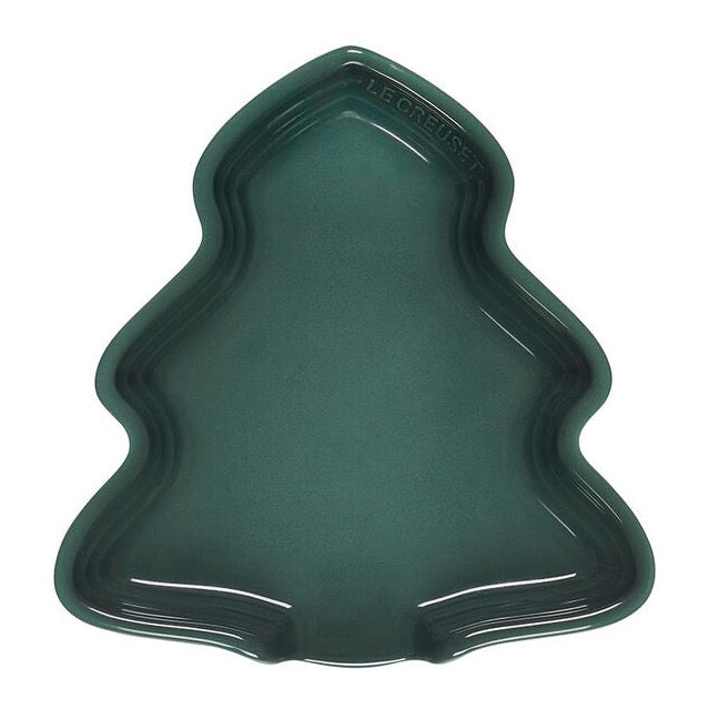 Dark green ceramic spoon rest. Spoon rest is shaped like a Christmas Tree