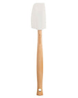 White baking spatula with wooden handle.