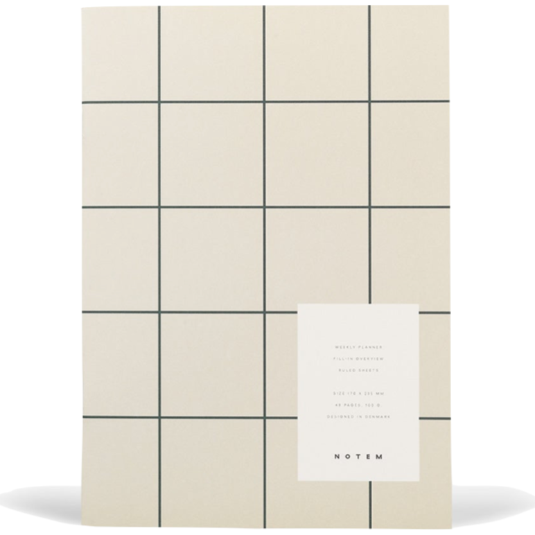 Cream colored notebook with gray grid detail.