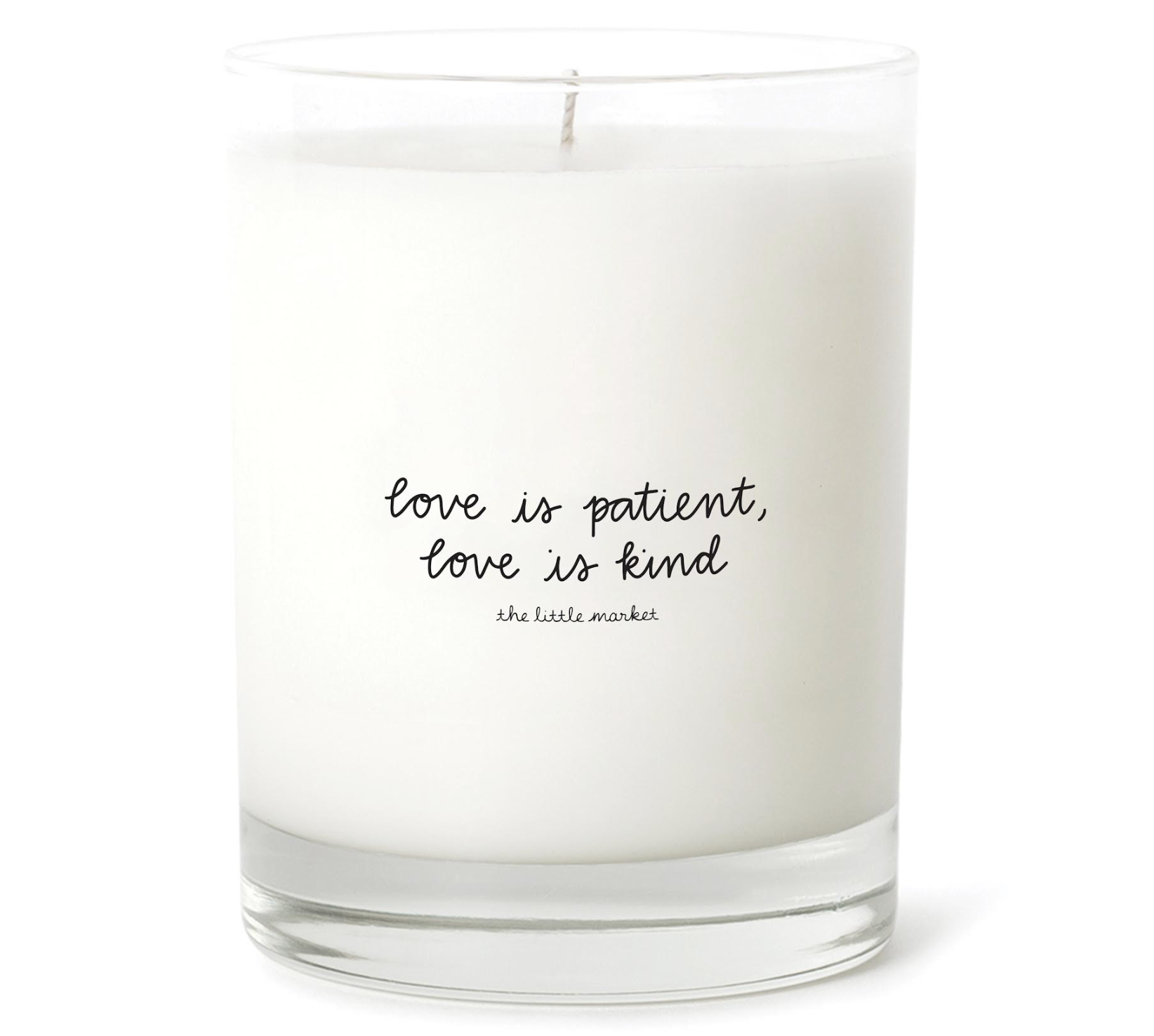 Clear glass jar with white wax candle that reads "love is patient, love is kind"