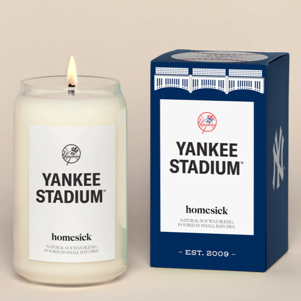 Yankee Stadium Candle lit next to navy box