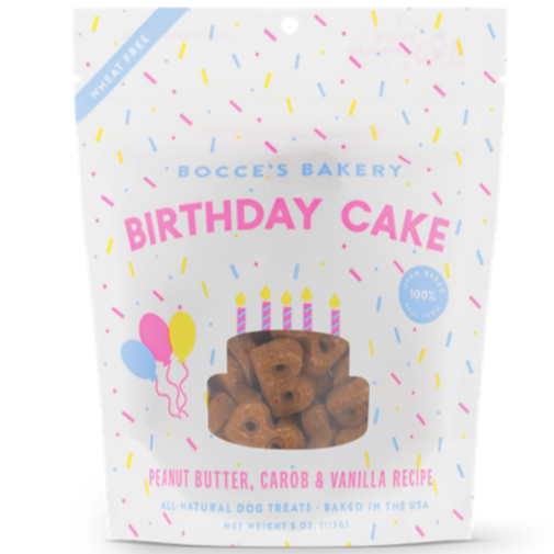 Bocces bakery birthday cake dog treats in white bag with colorful sprinkles all over it.