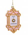 Ornate pink and gold ornament with "Press for Champagne" Button