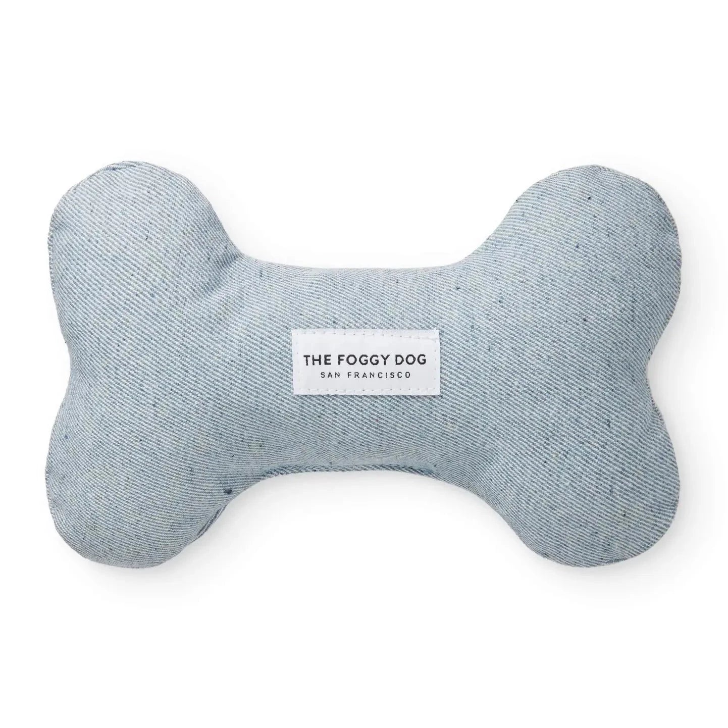 Light blue denim dog squeaky bone shaped toy. Has white label stitched in the middle
