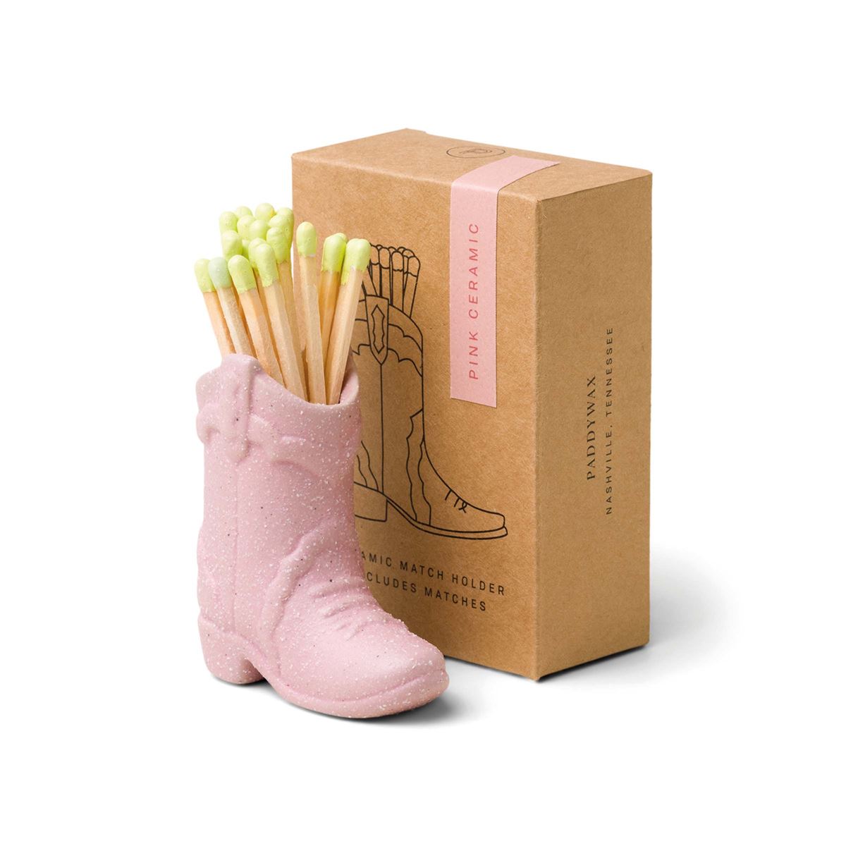 pink ceramic cowboy boot match holder with lime green safety matches by Paddywax.