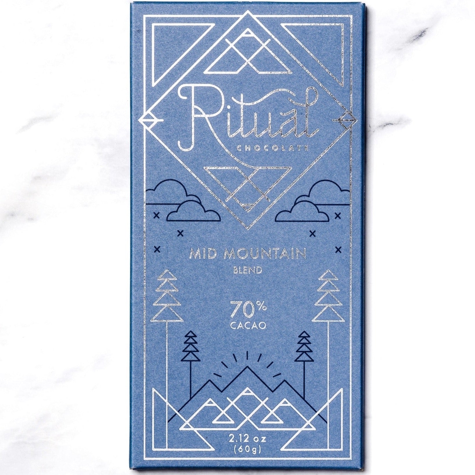 Ritual Chocolate bar in blue packaging and silver writing that says "Mid Mountain blend 70% Cacao"