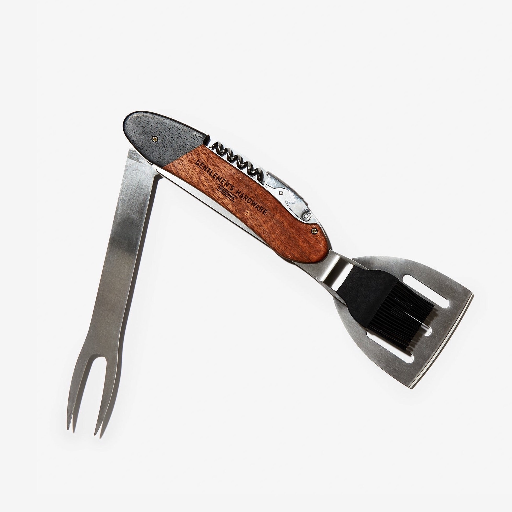 BBQ multitool with a spatula, brush, corkscrew, fork, and bottle opener 