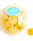 Plastic clear cube with yellow small balls flavored after lemon shortbread cookies